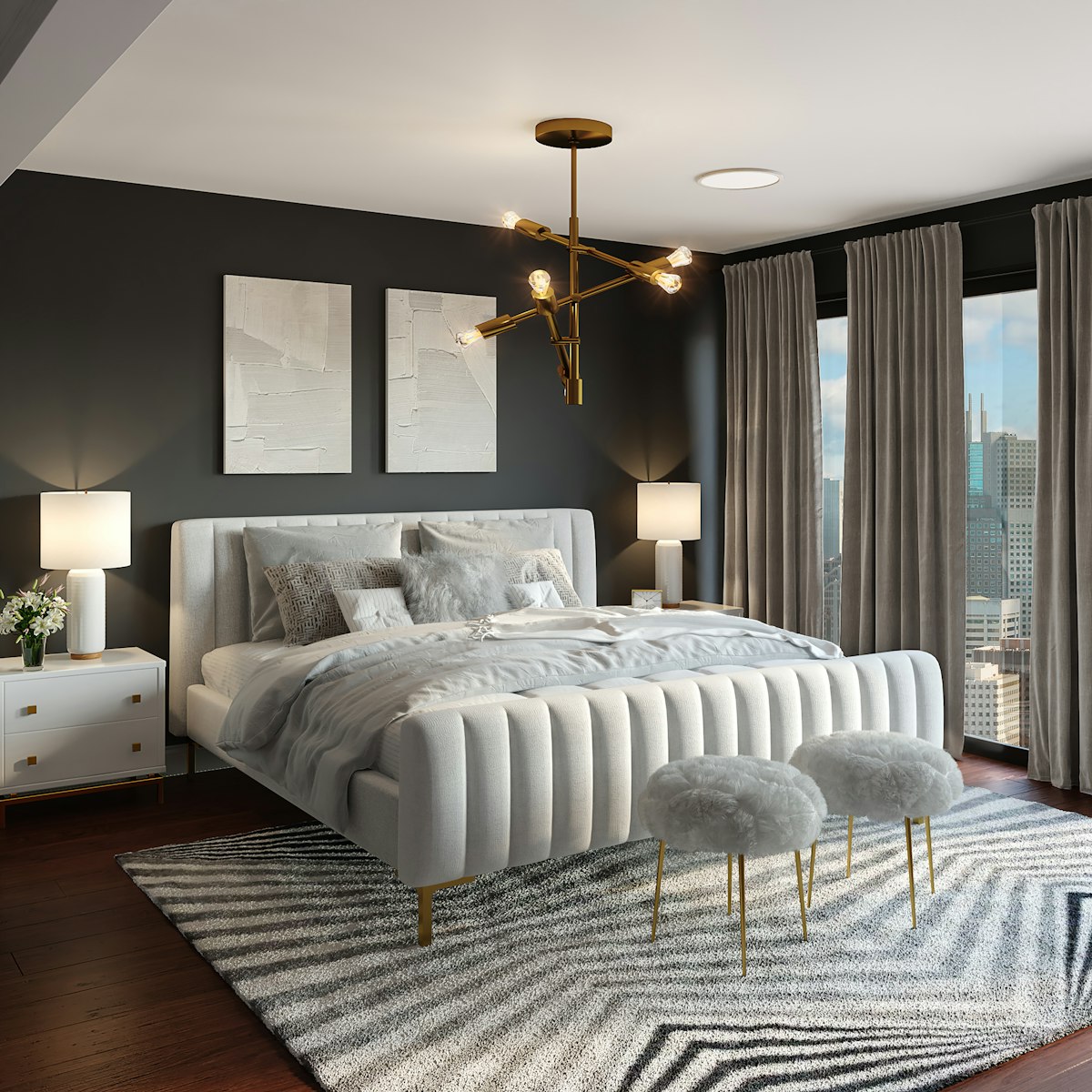 Elegantly styled bedroom with layered linen bedding, bedside lighting and calm neutral palette
